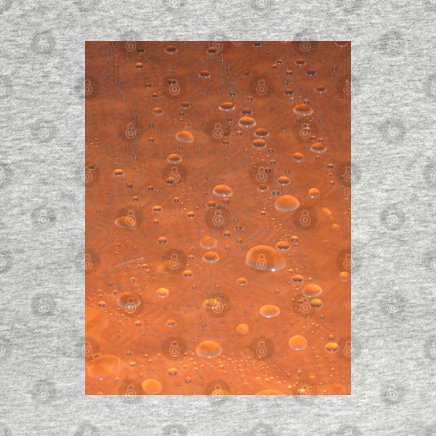 Water Droplets on Orange Table by jojobob